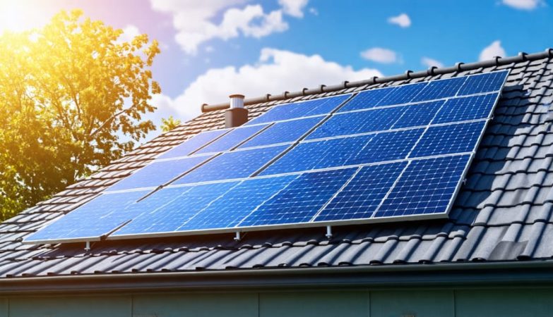 Solar panels on a home rooftop harnessing sunlight as part of a DIY solar backup system, promoting energy efficiency and sustainability.